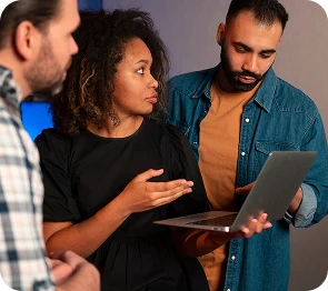 Team reviewing campaign performance on a laptop