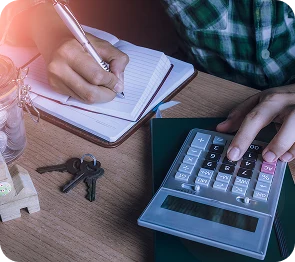 Hands reviewing expenses with a calculator and notebook